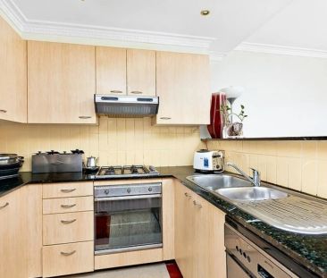 Three Bedroom Townhouse in Desirable Location - Photo 3