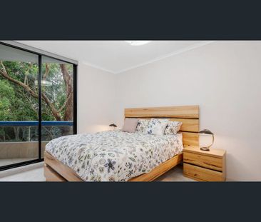 Elegantly Presented Apartment with Bridge and Water Views - Photo 3