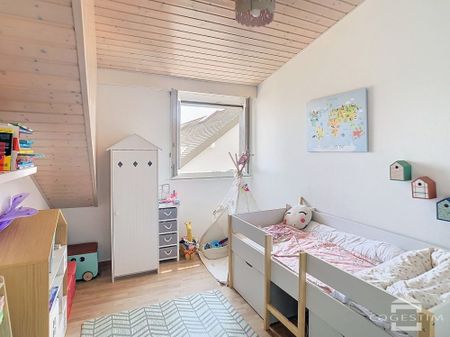 Dans un immeuble proche de la gare, appartement de 4,5 pièces au 2ème étage - Photo 4