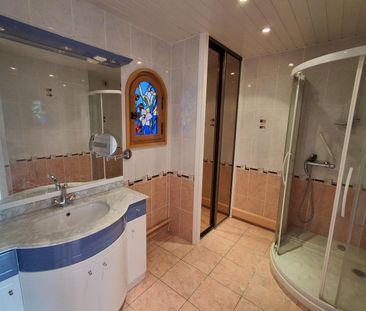 Location Appartement 4 pièces 100m² ST CHAMOND 42400 - Photo 4