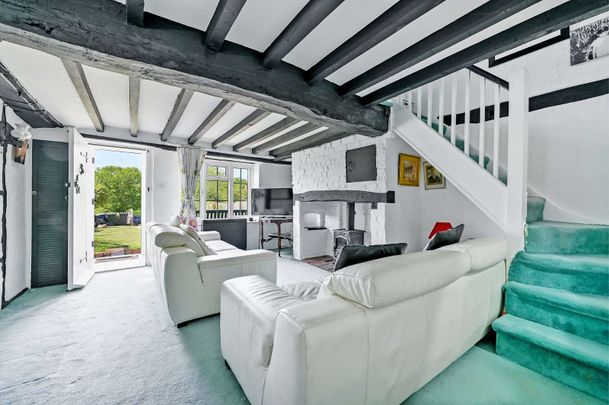 A pretty brick and flint character cottage located in the picturesque village of Radnage - Photo 1