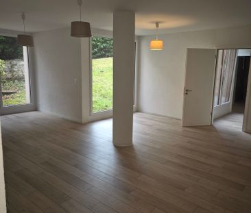 Appartement de 2.5 pièces au rez-de-chaussée - Photo 2