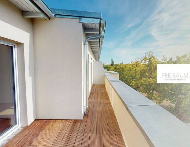 Moderne und geräumige 3-Zimmer-Penthousewohnung mit DACHTERRASSE und EBK im Weißenseer Neubauquartier FREIRAUM - Photo 1