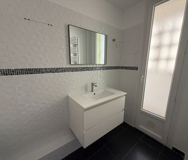 Location Appartement 4 pièces 64m² NIMES 30000 - Photo 3