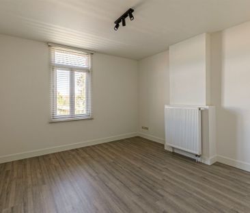 Woning met 2 slpks, tuin en 2 autostaanplaatsen - Foto 6