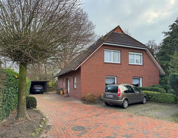 Gemütliche Dachgeschosswohnung mit Einbauküche in zentraler, dennoch ruhiger Lage von Ostgroßefehn - Foto 1