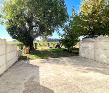 A LOUER MAISON DE TYPE 4 AVEC JARDIN - SECTEUR PUGNAC - Photo 5