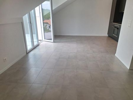 Appartement de 2,5 pièces aux combles dans un immeuble récent ! - Photo 4