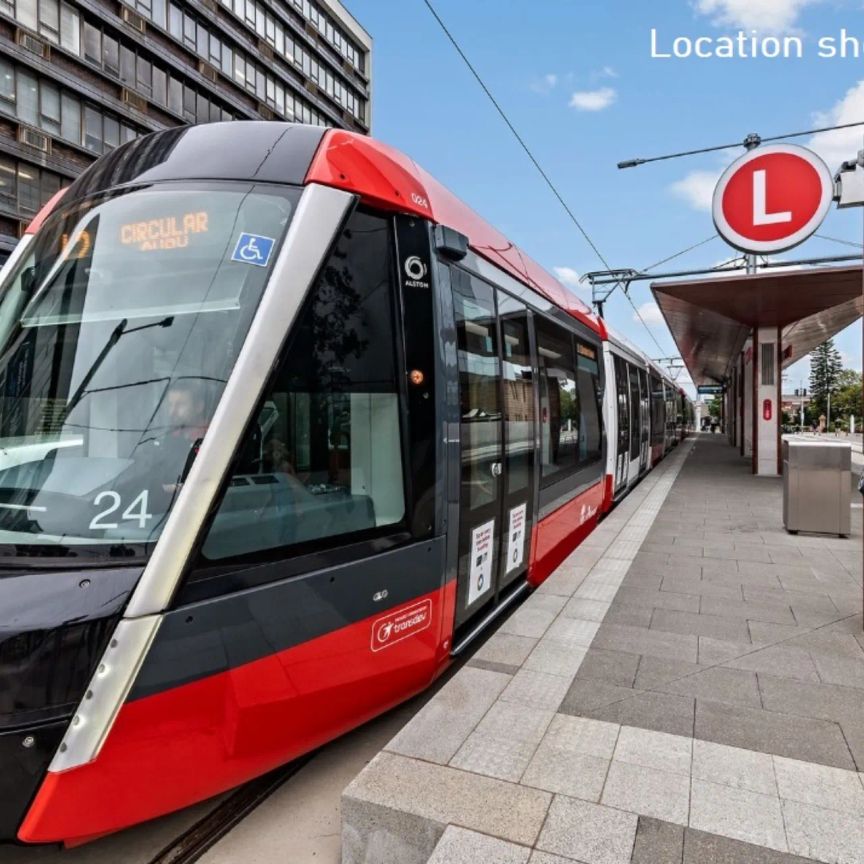 REJUVENATED AIR-CONDITIONED FAMILY HOME IN SOUGHT AFTER STREET - Photo 1