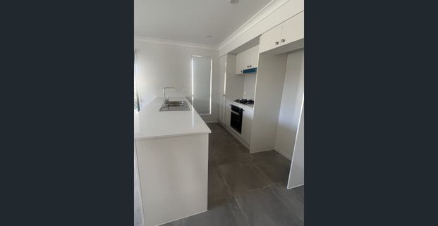 Brand new three bedroom villa located in popular Wyndham Ridge Estate of Greta - Photo 1