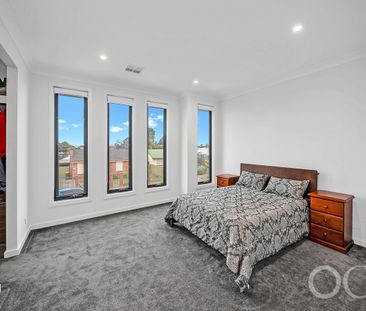Open the Door to Sun-Soaked Living in a Premium Woodville West Pocket - Photo 4