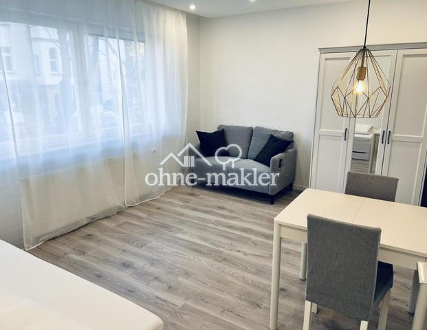 Moderne vollmöblierte 1-Zimmerwohnung mit Blick in die Stadt - Foto 1