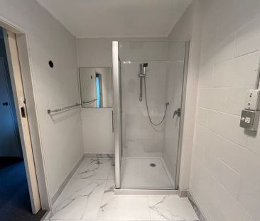 Charming 2BR Unit with Modern Renovations - Photo 6