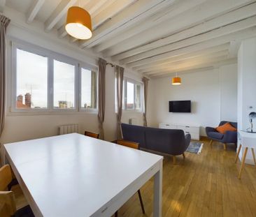 Au pied du centre ville, proche de la gare - Photo 1