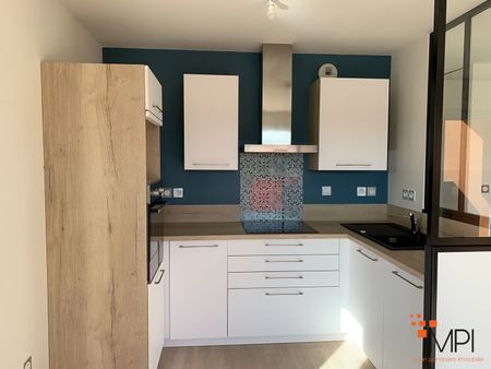 Location Appartement 3 pièces 65m² - Photo 3