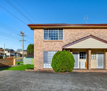 Stylish, Low-Maintenance Townhouse in a Prime Location - Photo 1
