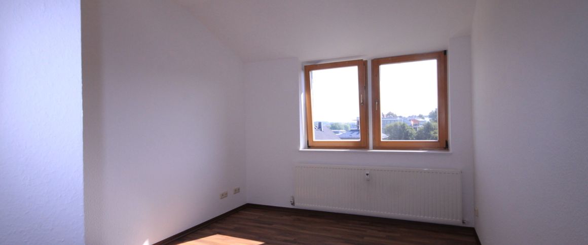 Tolle Dachgeschosswohnung mit großem Balkon - Foto 1