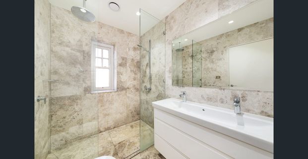 Stylish Renovation with Harbour Views in Prime Position - Photo 1