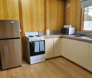 Neat & Tidy Fully Furnished 3-Bedroom Unit - Photo 4