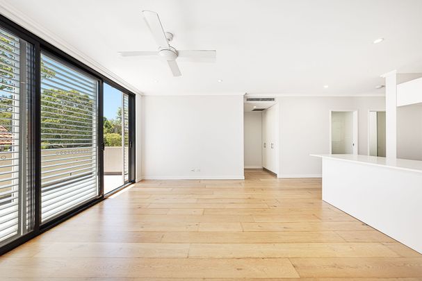 Boutique Building Top Floor Apartment with Secure Parking - Photo 1