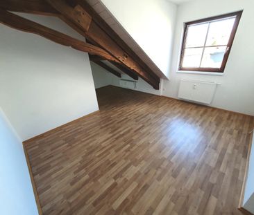 Geförderte Dachgeschosswohnung mit 2 Zimmern - Foto 1