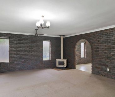 Brick home that effortlessly brings timeless charm - Photo 3