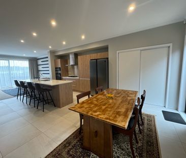 Modern, Light-Filled Family Home in Prime Long Bay Location - Photo 6