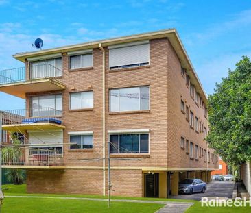 LARGE UNIT WITH OCEAN GLIMPSES! - Photo 1