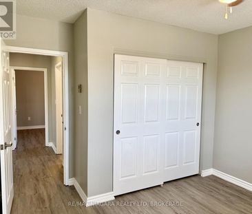 202 - 6837 THOROLD STONE ROAD, Niagara Falls, Ontario, L2J1B2 - Photo 1
