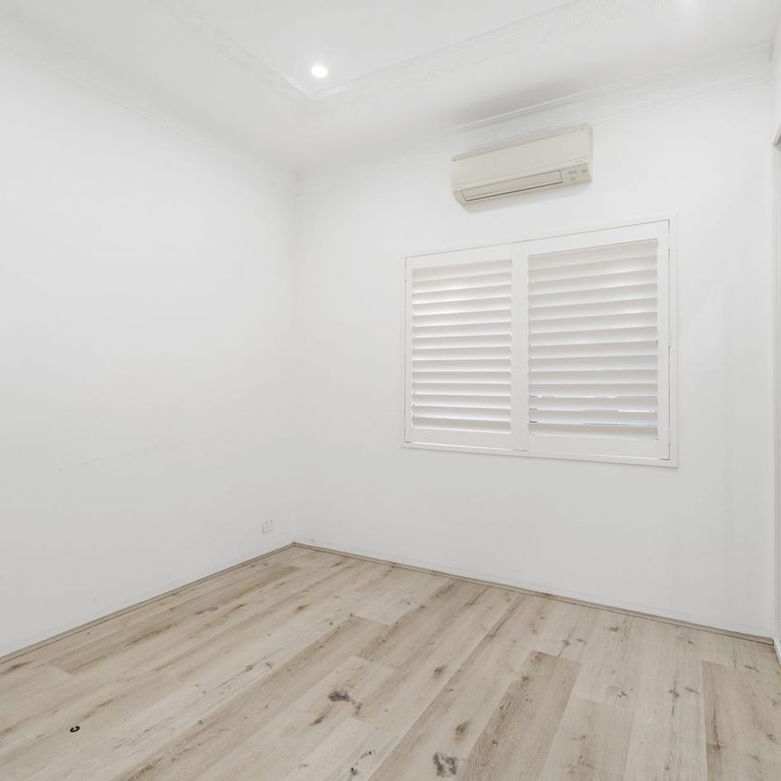 Charming Newly Renovated 2-Bedroom Home - Photo 1