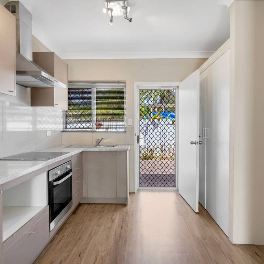 SPACIOUS 2 BEDROOM UNIT WITH PRIVATE YARD - Photo 1