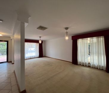 Large 4 Bedroom Home with 2 Living Areas! - Photo 1