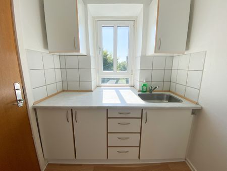 Velindrettet lejlighed med hyggeligt gårdmiljø - Photo 3