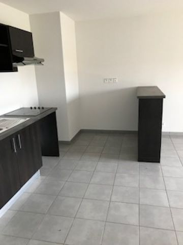 Location Appartement 3 pièces 54m² LAUNAGUET 31140 - Photo 2