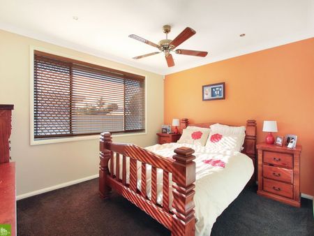 3 Bedroom Home with the Garage You've Been Looking For! - Photo 2