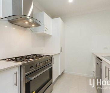 Modern Family Home with Stylish Finishes & Low-Maintenance Living - Photo 6