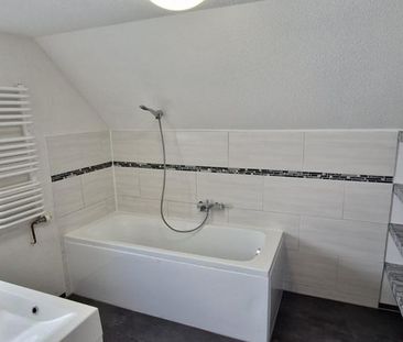 Sonnige Dachgeschosswohnung mit Ausblick. - Foto 4