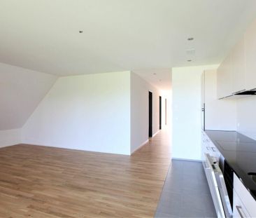 Gemütliche 4.5 Zimmerwohnung mit Balkon und Aussicht ins Grüne. - Foto 1