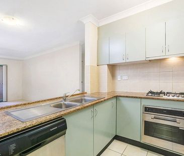 Take a Walk on The Quiet Side with this Two Bedroom Unit - Photo 4