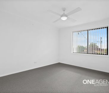 COMFORTABLE FAMILY LIVING IN THE HEART OF BARRACK HEIGHTS - Photo 2