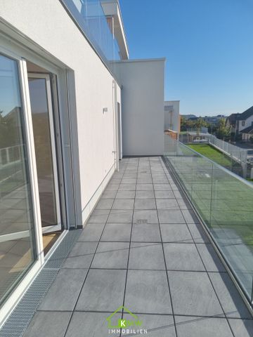 Exklusive Erstbezug-Wohnung mit Balkon und 2 Garagen - modernes Design und hochwertige Ausstattung - Foto 4