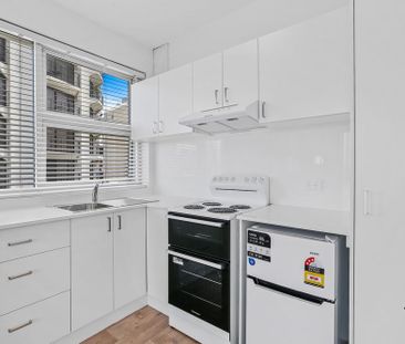 Renovated Studio Apartment with Large Terrace and District Views - Photo 4