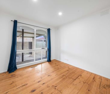 Spacious & Sunlit Living - Photo 4