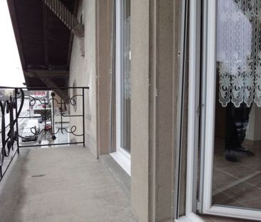 2.0 pces avec balcon et place de parc au centre du village - Photo 4