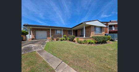 Delightful Family Home in Quiet Taree West Cul-de-Sac - Photo 4