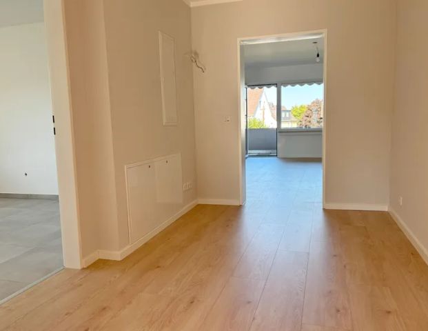 WIE NEU: 4-Zimmer-Wohnung mit Balkon in Paffrath in Gartenlage - Photo 1