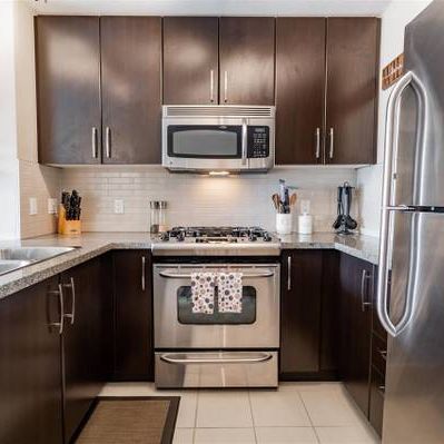 WALK TO SKYTRAIN FROM THIS 2 BED/2 BATH IN KLAHANIE - Photo 1