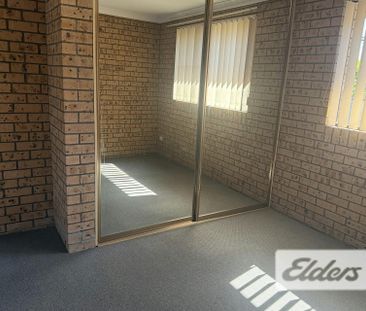 PRIVATE COURTYARD + EASY CARE LIVING - Photo 1