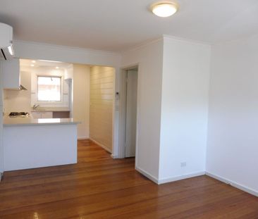 Charming Unit with Modern Amenities - Photo 1