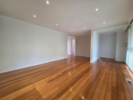 Freshly Painted, Perfectly Positioned Three Bedroom! - Photo 4